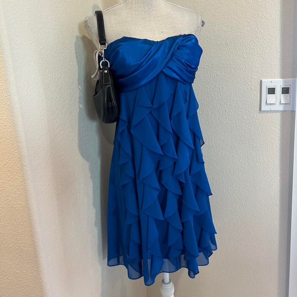 Cache blue ruffle strapless dress.